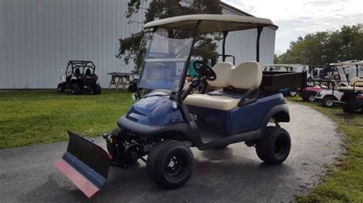 Can an electric golf cart plow snow?
