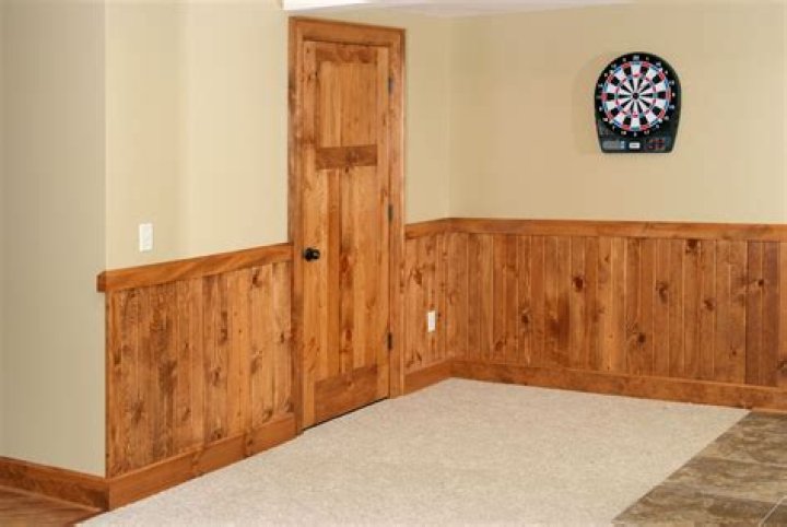 Can I paint over knotty pine paneling?