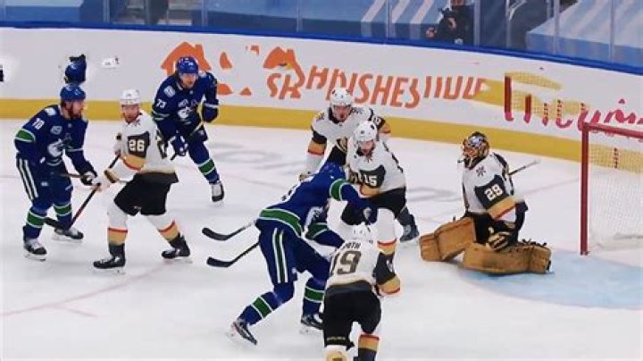 Can you kick in a goal in hockey?