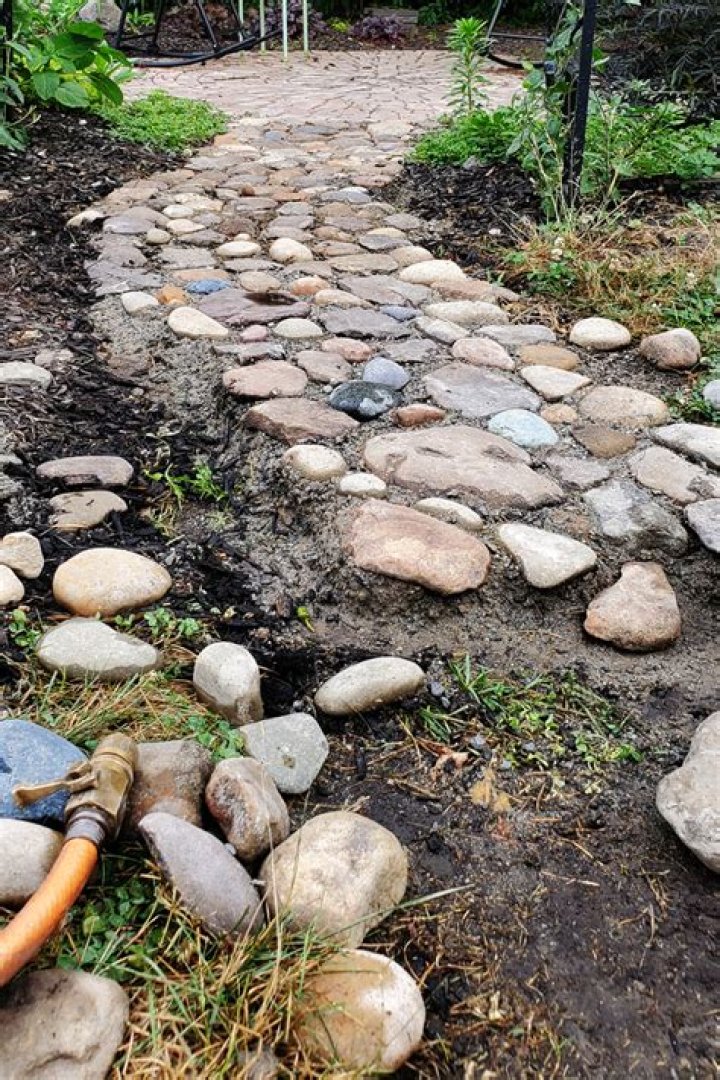 Can you put river rock in concrete?