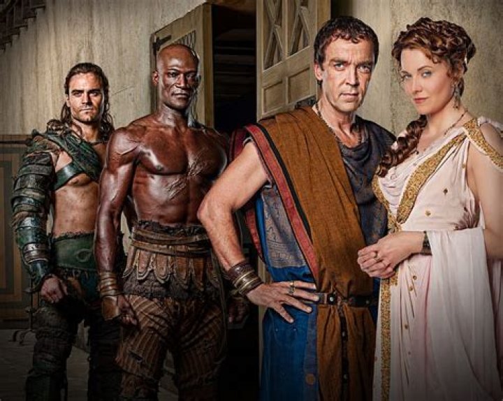 Does oenomaus find out about Gannicus and his wife?