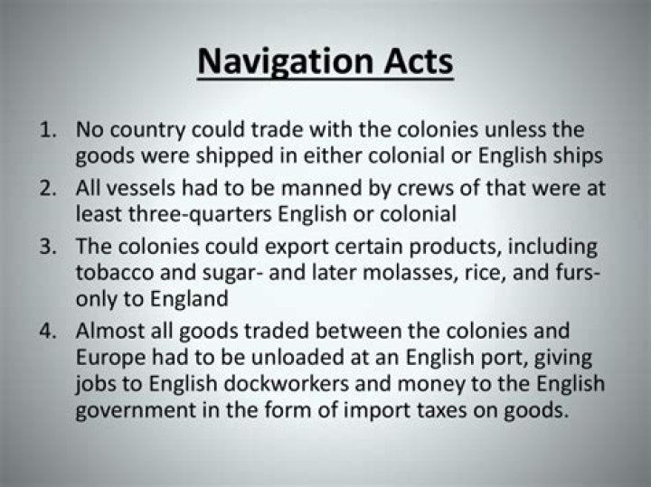 How did the Navigation Acts affect colonial economies?