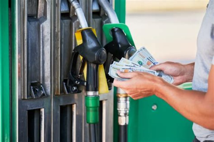 How do changing gas prices affect behavior in a market economy?
