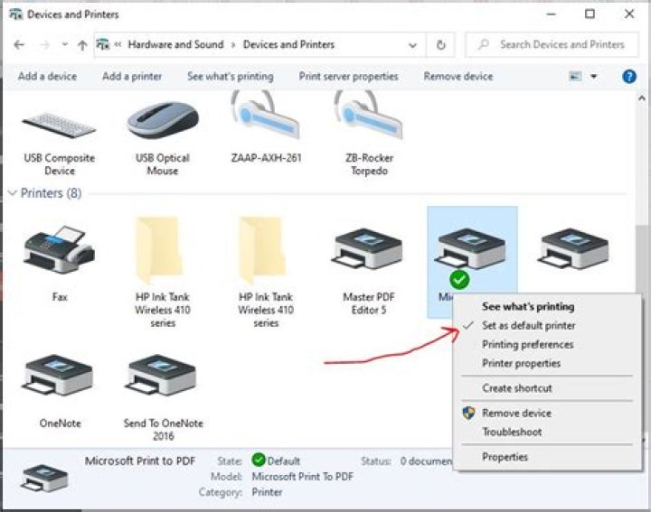 How do I change the default printer tray?