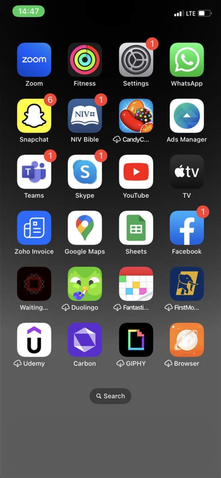 How do I change the home screen layout on my iPhone?
