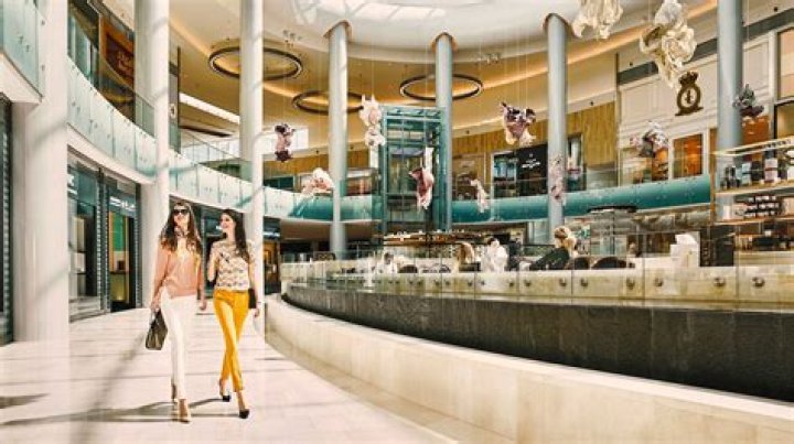 How do shopping malls help the economy?