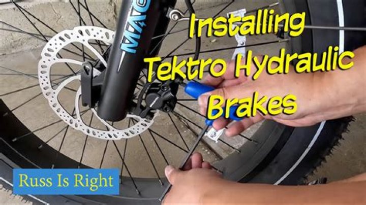 How do you adjust Tektro hydraulic disc brake levers?