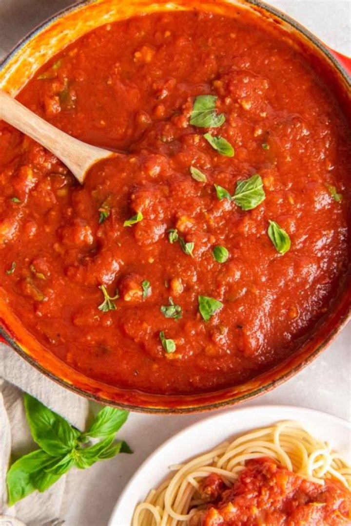 How do you make spaghetti sauce more flavorful?