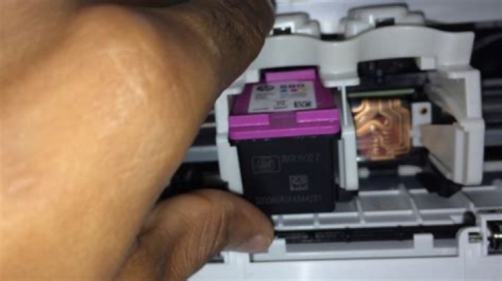 How do you replace HP ink cartridge?