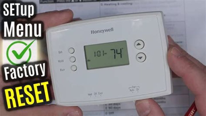 How do you reset the thermostat on a ct100?