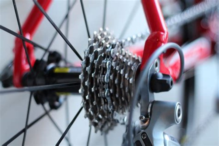 How do you shift gears smoothly on a bike?