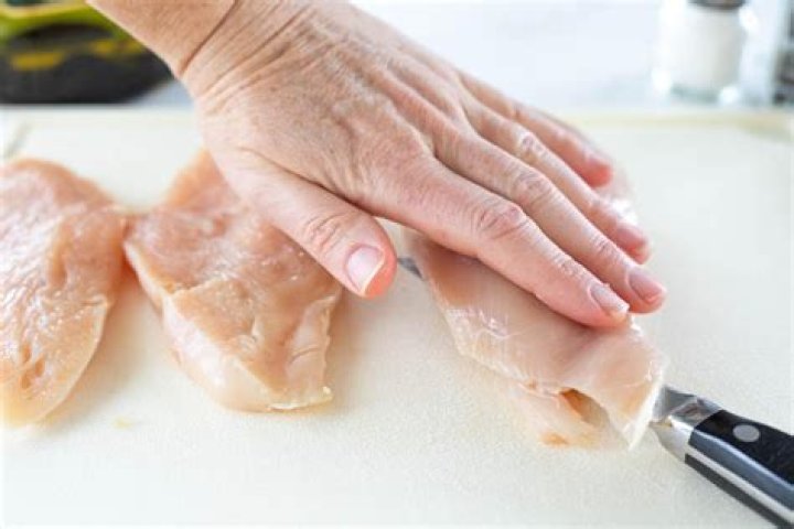 How do you slice chicken breast for fajitas?