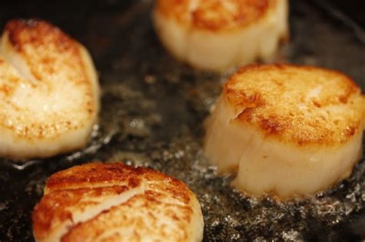 How long should I sear my scallops?
