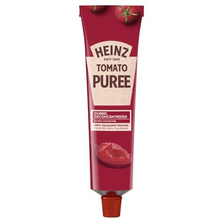 How many calories are in a tube of tomato puree?