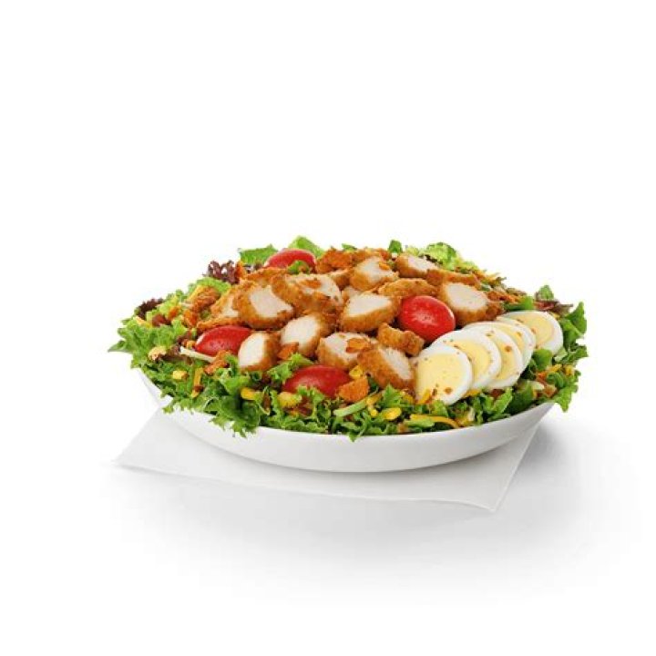 How many calories in Chick-fil-A Cobb Salad with grilled chicken nuggets?