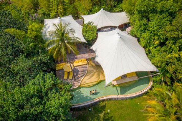 How many rooms does Soneva Kiri have?