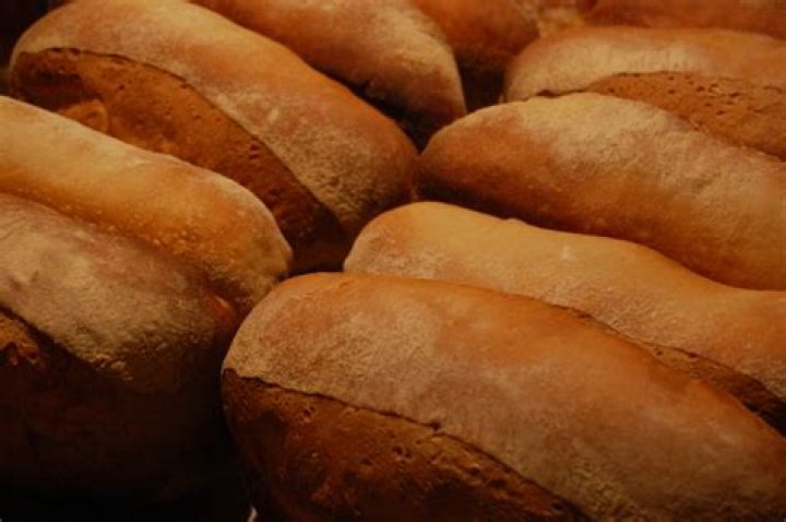 How much did a loaf of bread cost in 1960?