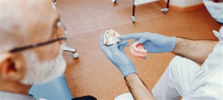 How much do denture stabilization implants cost?