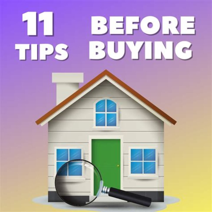 How much should I make a year before buying a house?