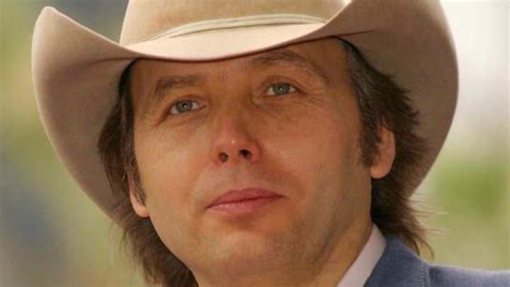 How old is Dwight Yoakam and how much is he worth?