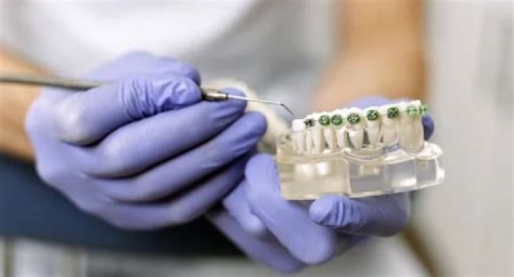 Is it cheaper to get braces at a dental school?