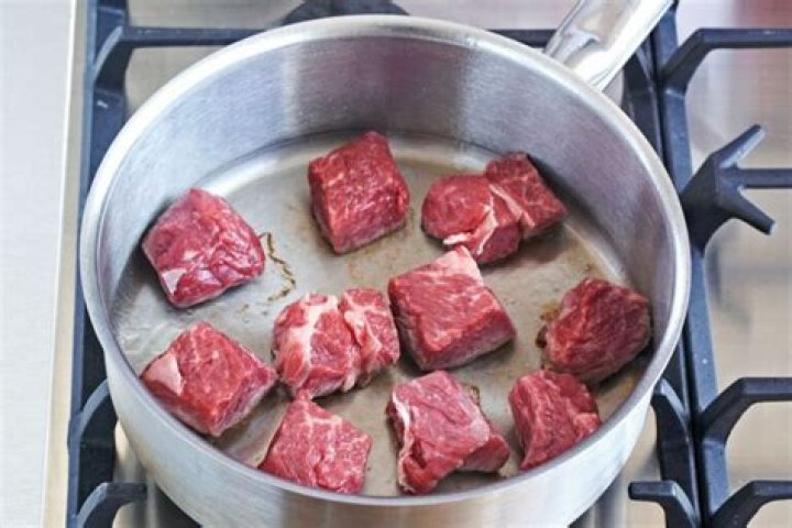 Should I flour stew meat before browning?