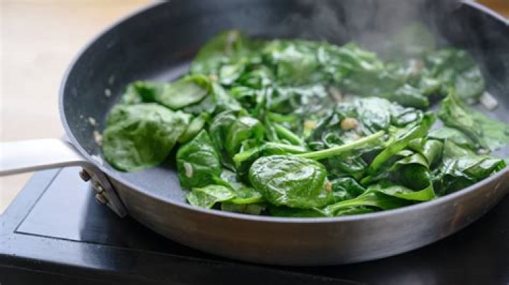 Should we boil spinach before cooking?