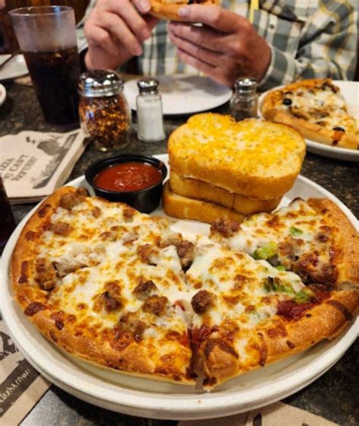 What are godfathers specialty pizzas?