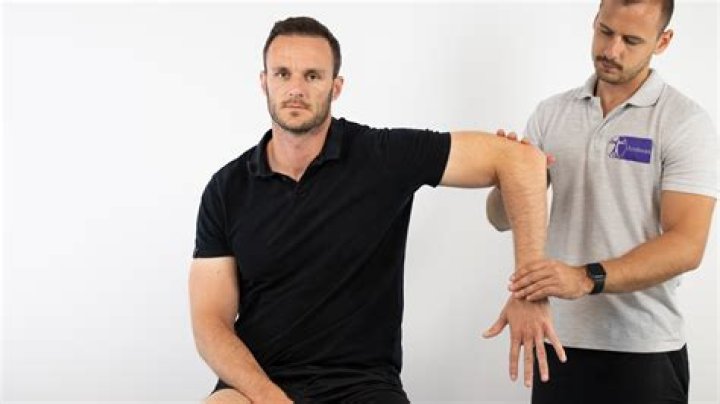 What causes pain with internal rotation of the shoulder?