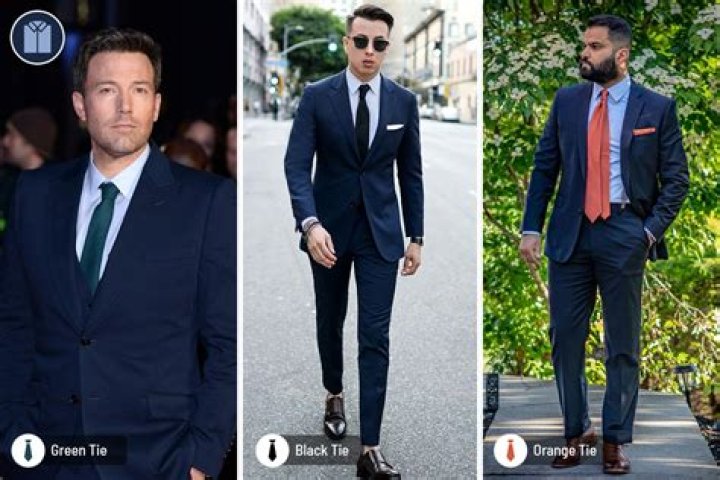 What color shirt goes with a navy blue suit?