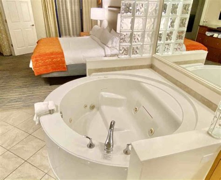 What do you call a hotel room with a jacuzzi?