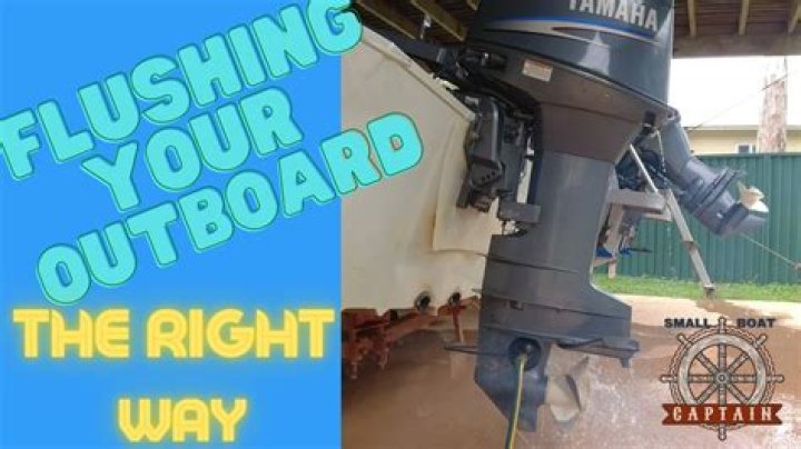 What do you use to flush an outboard motor?