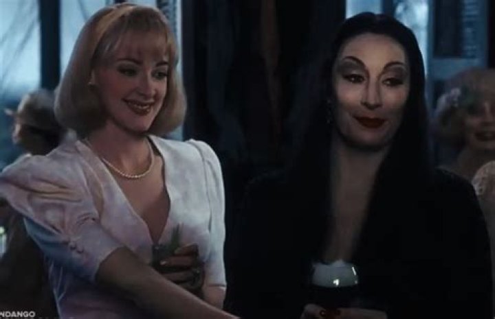What does Morticia say to Debbie?