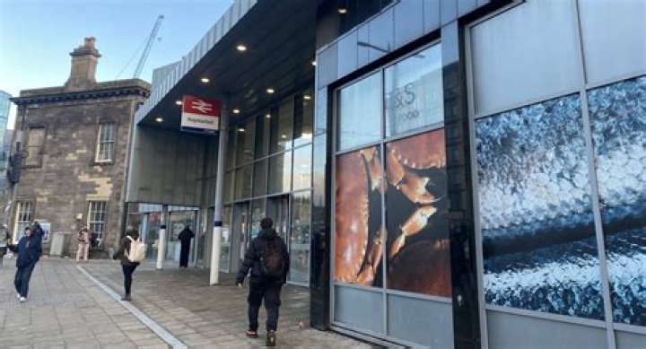 What is Edinburgh main train station called?
