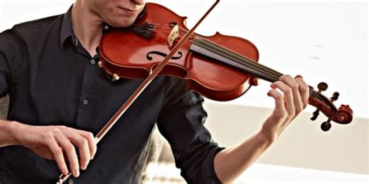 What is it called when you play a violin with a bow?