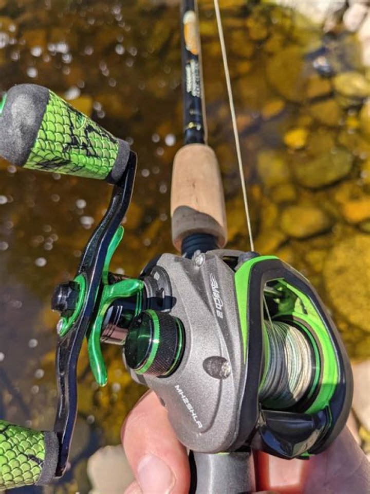 What is the trick to using a baitcaster?