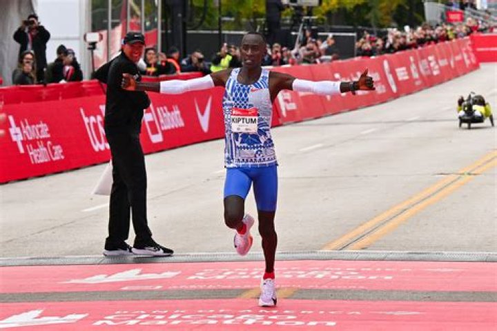 What is the world record of 42 km marathon?
