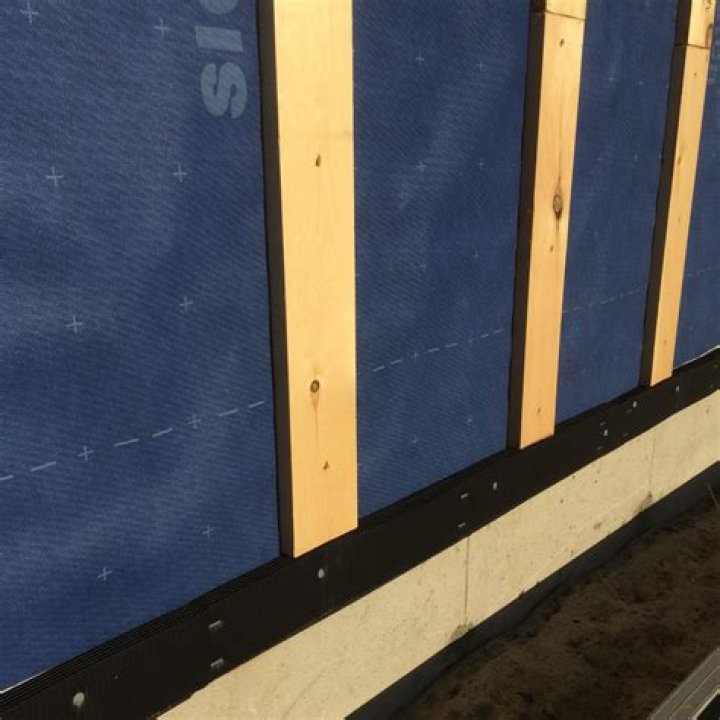 What type of sheathing is used for exterior walls?