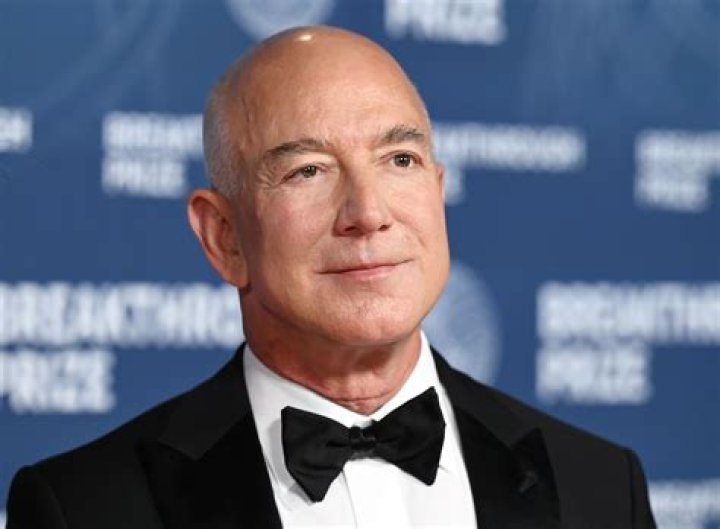 What was Jeff Bezos worth in 2014?