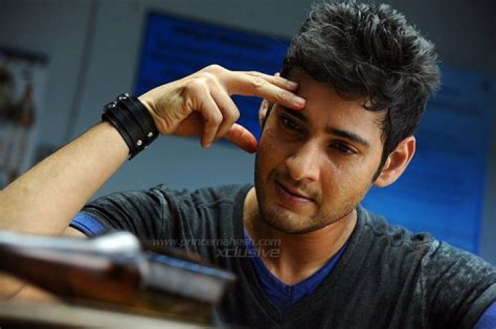 Who is the director of the movie Nenokkadine?