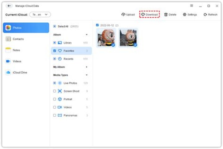 Why are my iCloud Photos not syncing to my PC?