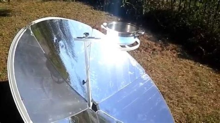 Why are solar cookers in parabolic shape?