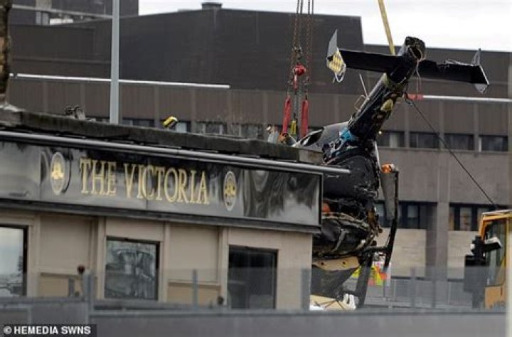 Why did the police helicopter crash in Glasgow?
