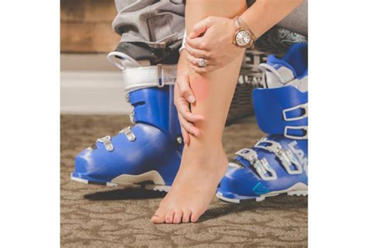 Why do my calves hurt in ski boots?